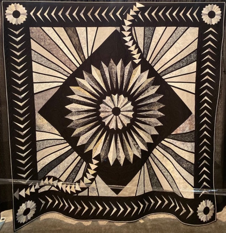"Midnight Rayes" by Mary Brown, Quilted by Lovenia Casto
